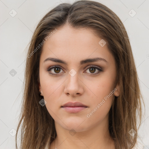 Neutral white young-adult female with long  brown hair and brown eyes