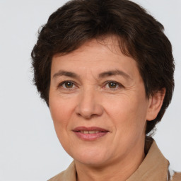 Joyful white adult female with short  brown hair and brown eyes