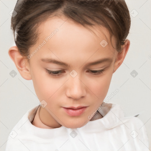 Joyful white child female with short  brown hair and brown eyes