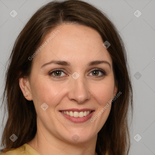 Joyful white adult female with medium  brown hair and brown eyes