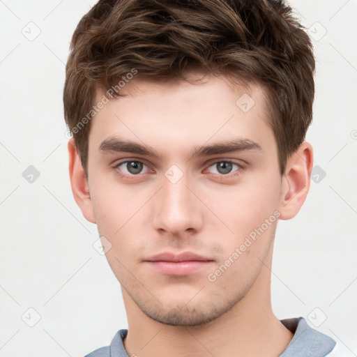 Neutral white young-adult male with short  brown hair and brown eyes