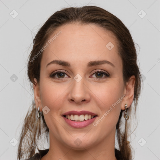 Joyful white young-adult female with medium  brown hair and grey eyes