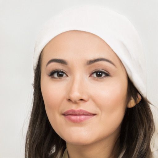 Joyful white young-adult female with long  black hair and brown eyes