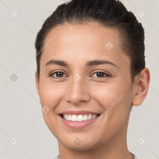 Joyful white young-adult female with short  brown hair and brown eyes