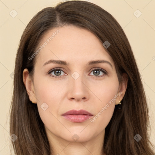 Neutral white young-adult female with long  brown hair and brown eyes