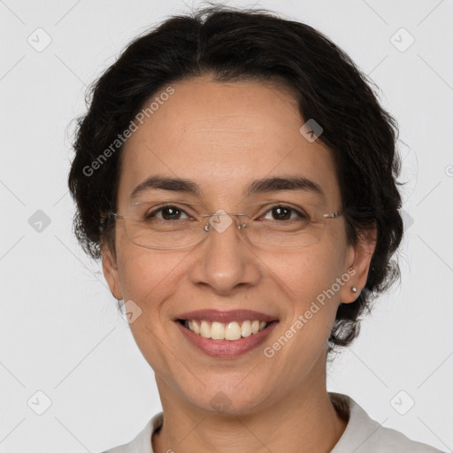 Joyful white adult female with short  brown hair and brown eyes