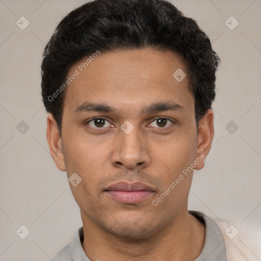 Neutral latino young-adult male with short  brown hair and brown eyes