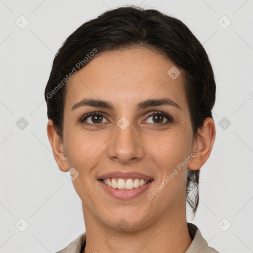 Joyful white young-adult female with short  brown hair and brown eyes