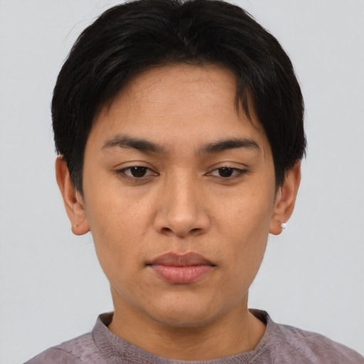 Joyful asian young-adult female with short  black hair and brown eyes
