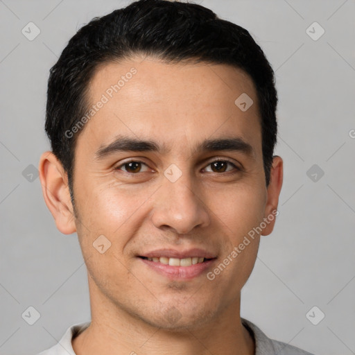 Joyful white young-adult male with short  black hair and brown eyes