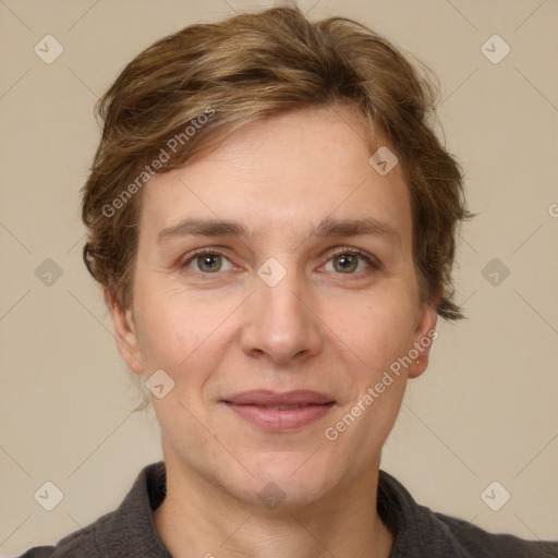 Joyful white adult female with short  brown hair and brown eyes