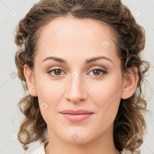 Joyful white young-adult female with medium  brown hair and green eyes