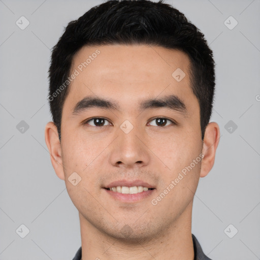 Joyful white young-adult male with short  black hair and brown eyes