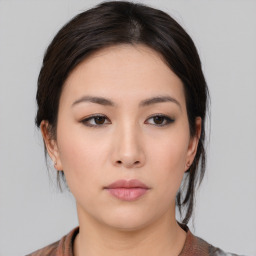 Neutral asian young-adult female with medium  brown hair and brown eyes