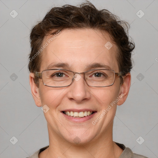 Joyful white adult female with short  brown hair and grey eyes