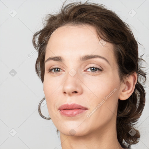 Neutral white young-adult female with medium  brown hair and brown eyes