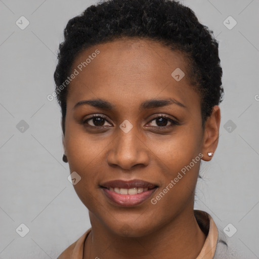 Joyful black young-adult female with short  brown hair and brown eyes