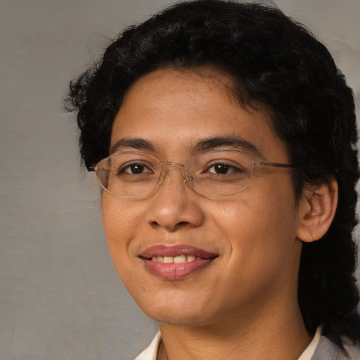 Joyful asian adult female with short  brown hair and brown eyes