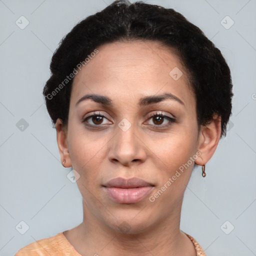 Joyful latino young-adult female with short  black hair and brown eyes