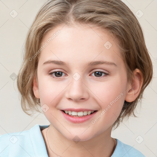 Joyful white child female with medium  brown hair and grey eyes