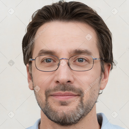 Joyful white adult male with short  brown hair and grey eyes