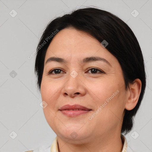 Joyful white adult female with medium  brown hair and brown eyes