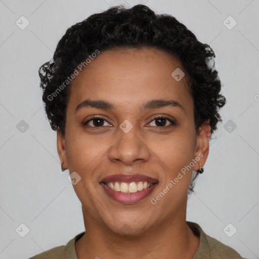 Joyful black young-adult female with short  brown hair and brown eyes