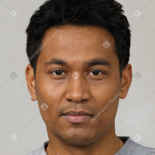 Neutral latino young-adult male with short  black hair and brown eyes