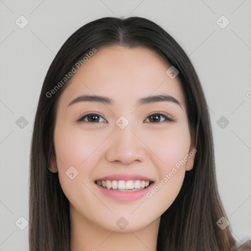 Joyful white young-adult female with long  black hair and brown eyes