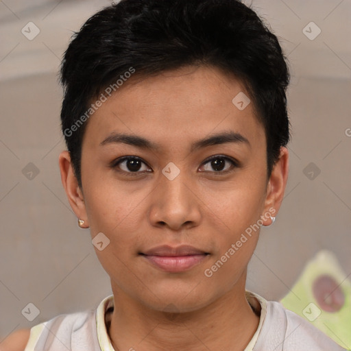 Joyful latino young-adult female with short  black hair and brown eyes