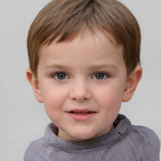 Joyful white child male with short  brown hair and brown eyes