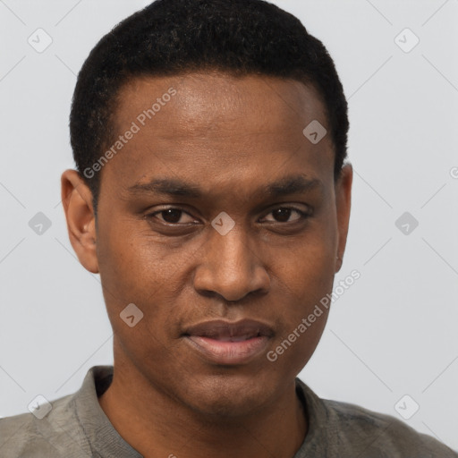 Joyful black young-adult male with short  brown hair and brown eyes