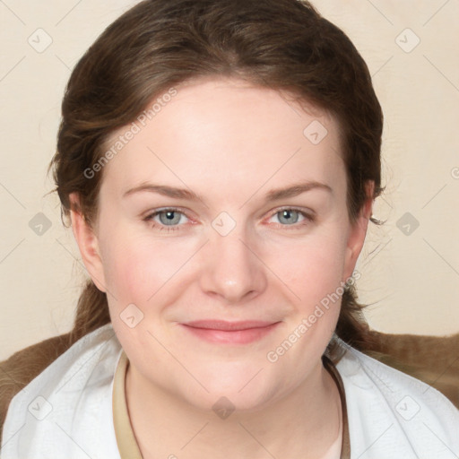 Joyful white young-adult female with medium  brown hair and blue eyes