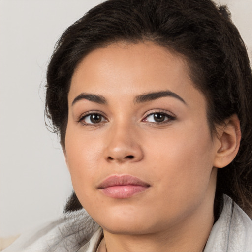 Neutral white young-adult female with medium  brown hair and brown eyes