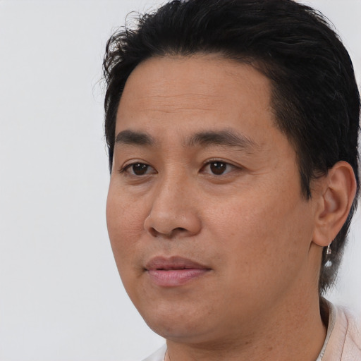 Neutral asian young-adult male with short  black hair and brown eyes
