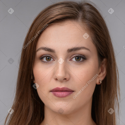 Neutral white young-adult female with long  brown hair and brown eyes