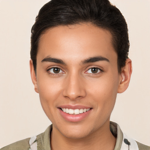 Joyful white young-adult male with short  brown hair and brown eyes