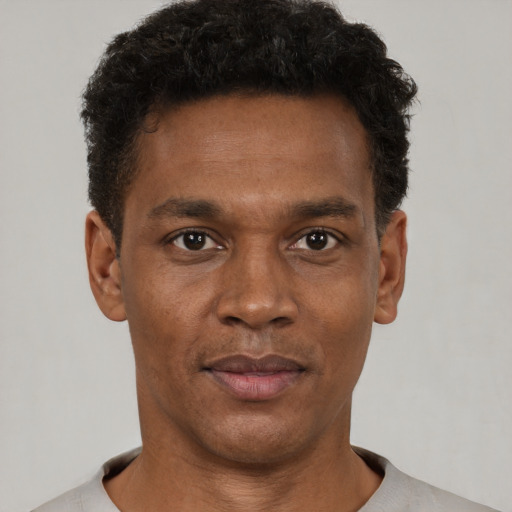 Neutral black young-adult male with short  brown hair and brown eyes
