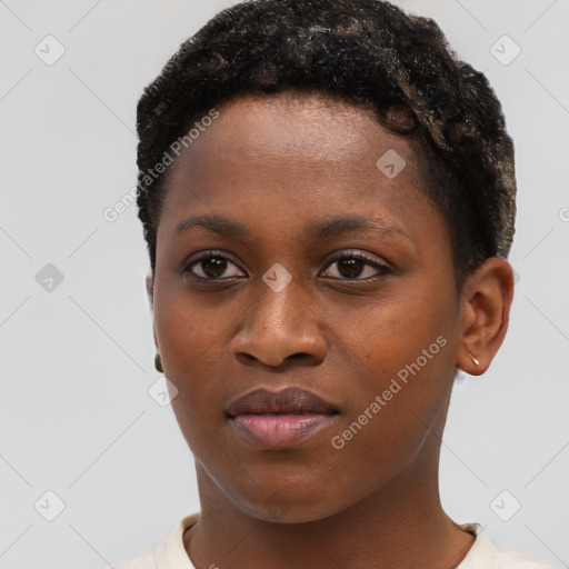 Neutral black young-adult female with short  brown hair and brown eyes