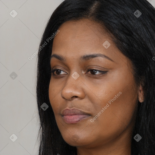 Joyful asian young-adult female with long  black hair and brown eyes