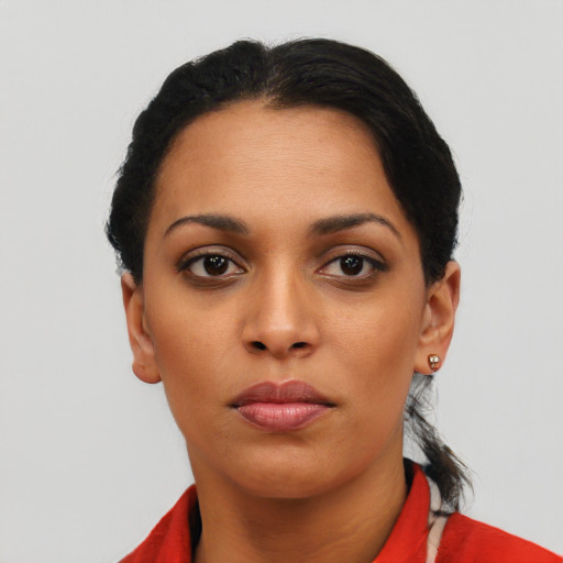 Neutral latino young-adult female with short  black hair and brown eyes