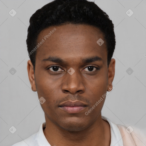 Neutral black young-adult male with short  black hair and brown eyes