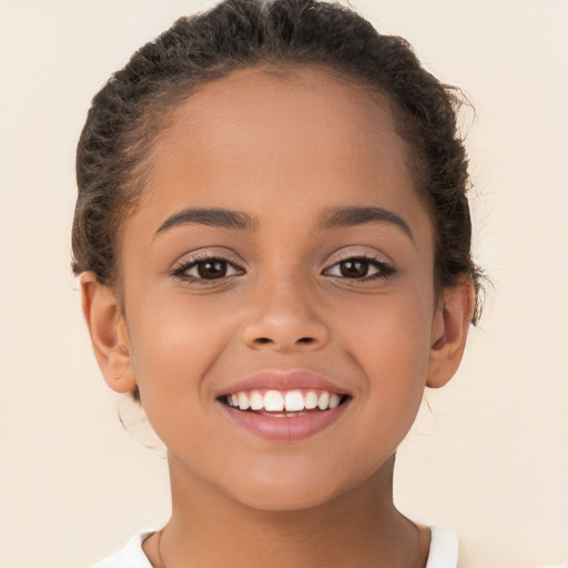 Joyful white child female with short  brown hair and brown eyes