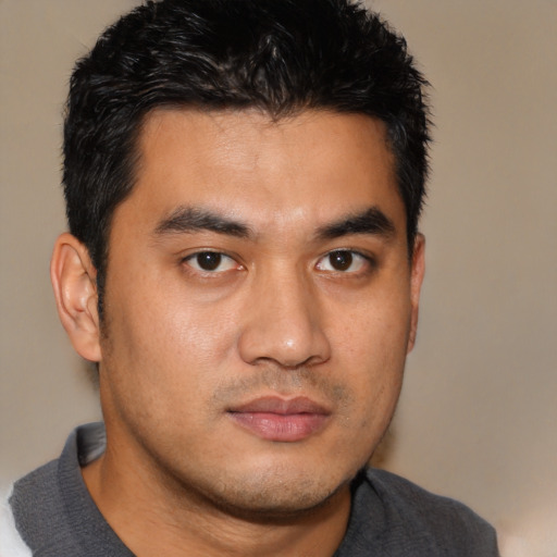 Neutral asian young-adult male with short  black hair and brown eyes