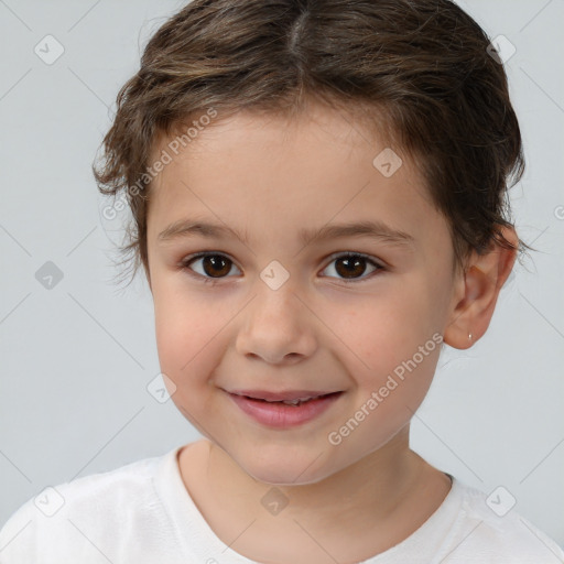 Joyful white child female with short  brown hair and brown eyes