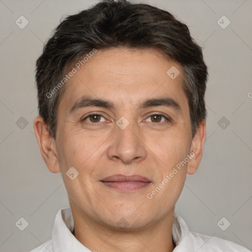 Joyful white adult male with short  brown hair and brown eyes