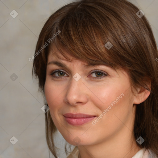 Joyful white adult female with medium  brown hair and brown eyes