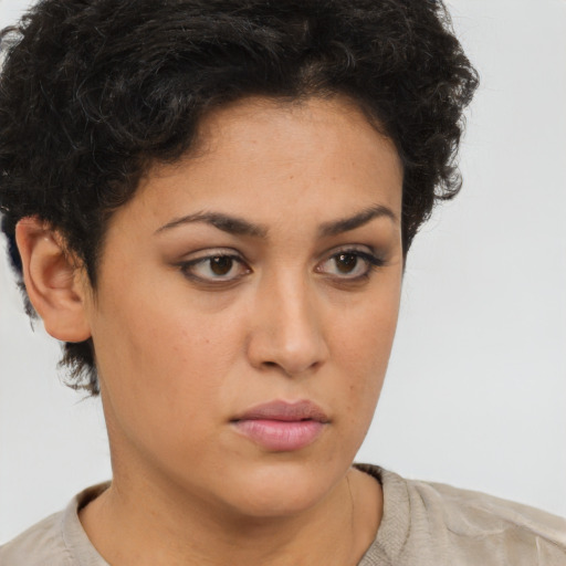 Neutral latino young-adult female with short  brown hair and brown eyes