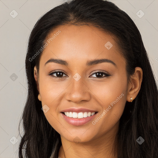 Joyful latino young-adult female with long  brown hair and brown eyes