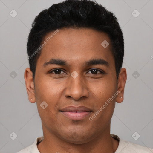 Joyful latino young-adult male with short  black hair and brown eyes